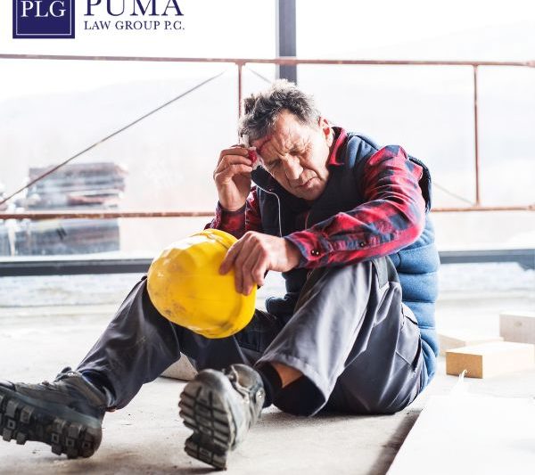 A construction worker sits on the floor holding his head and a yellow hard hat, appearing injured or distressed. PLG Puma Law Group logo is visible in the top left corner.